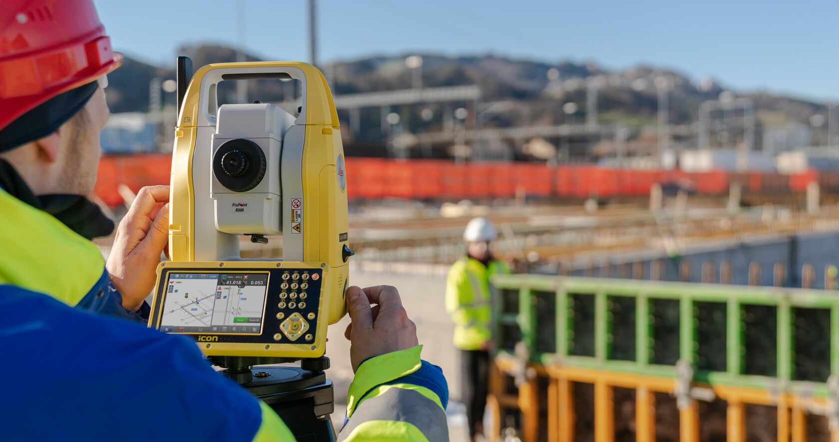 Field technician servicing survey equipment